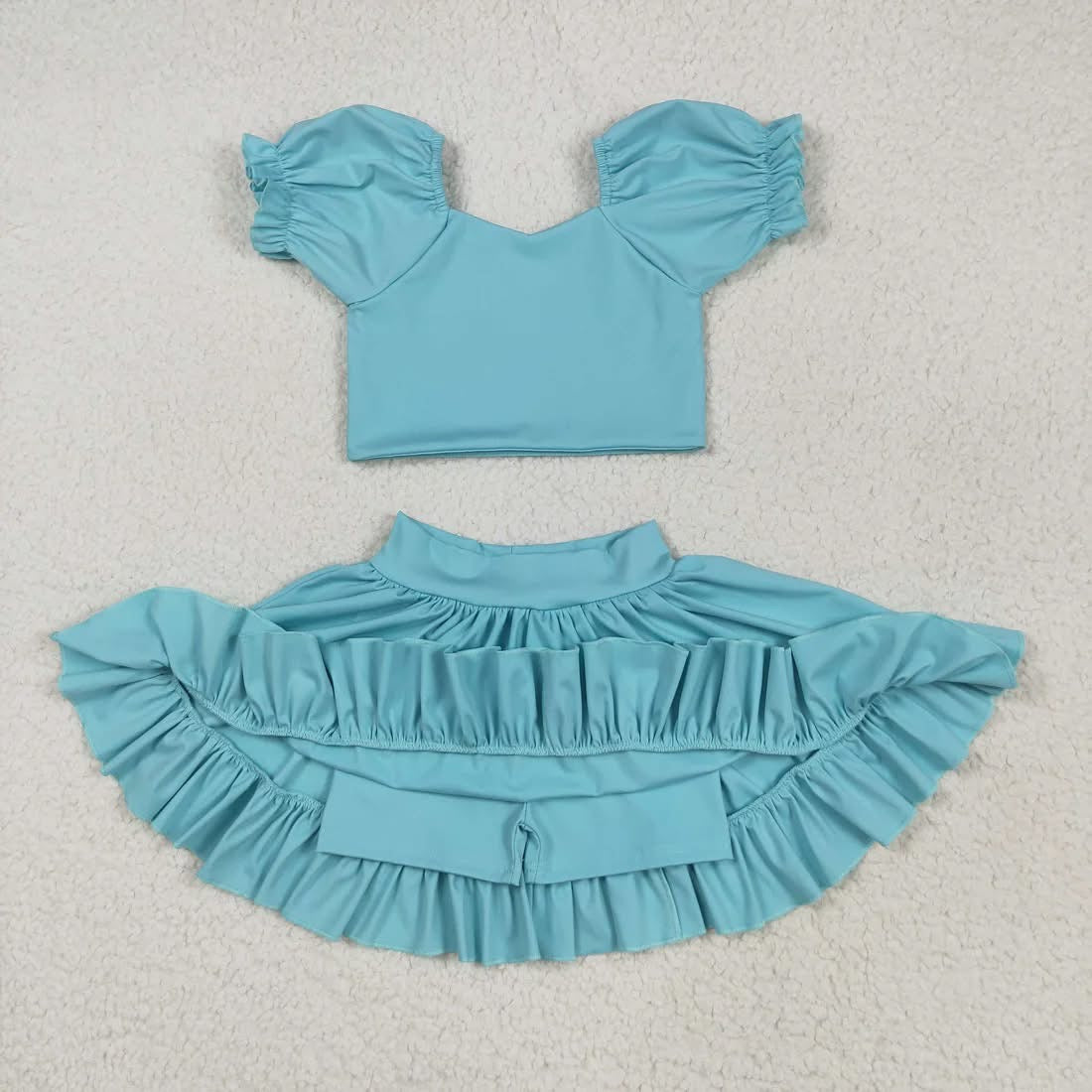 Turquoise athletic set with shorts built in
